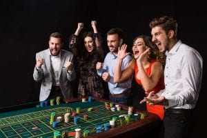 group of friends playing poker