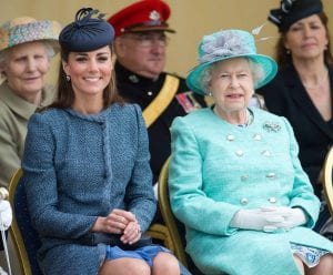 kate middleton and queen elizabeth watching a tennis match